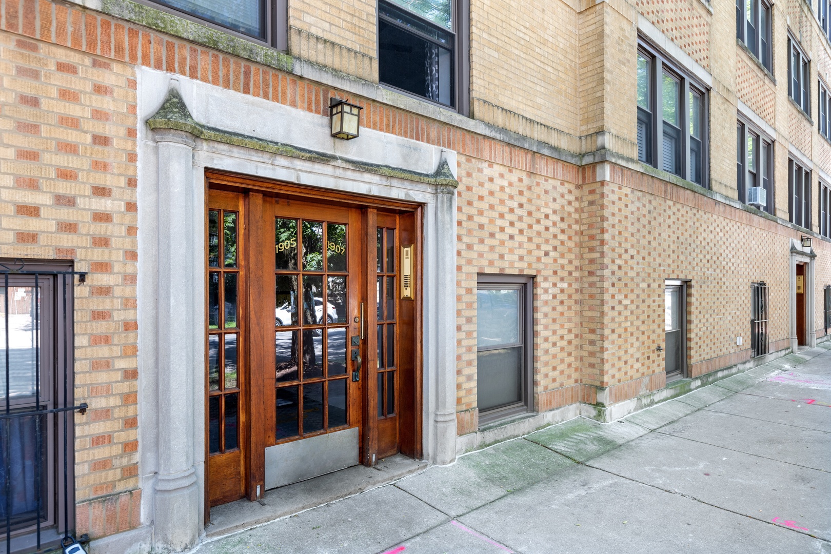 1905 West Winona Street, Unit 2 Chicago, IL 60640 - Photo 1 of 18 a view of a brick building with a door