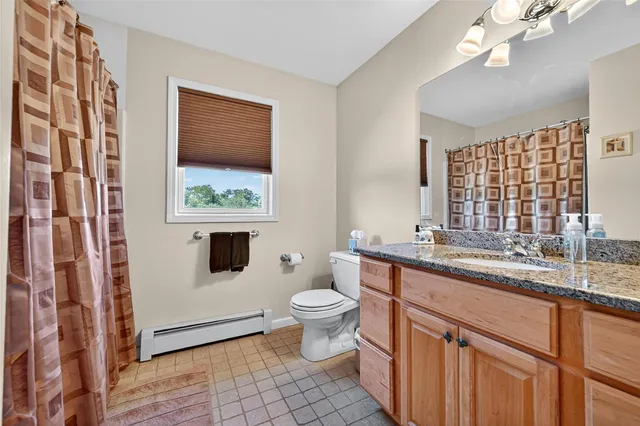 a view of balcony with wooden floor and fence