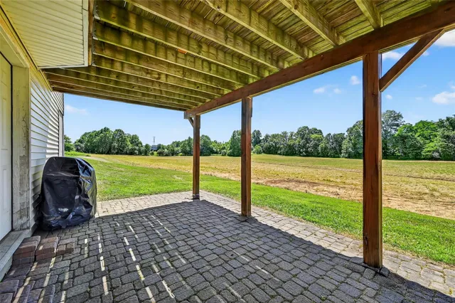 a house view with a outdoor space