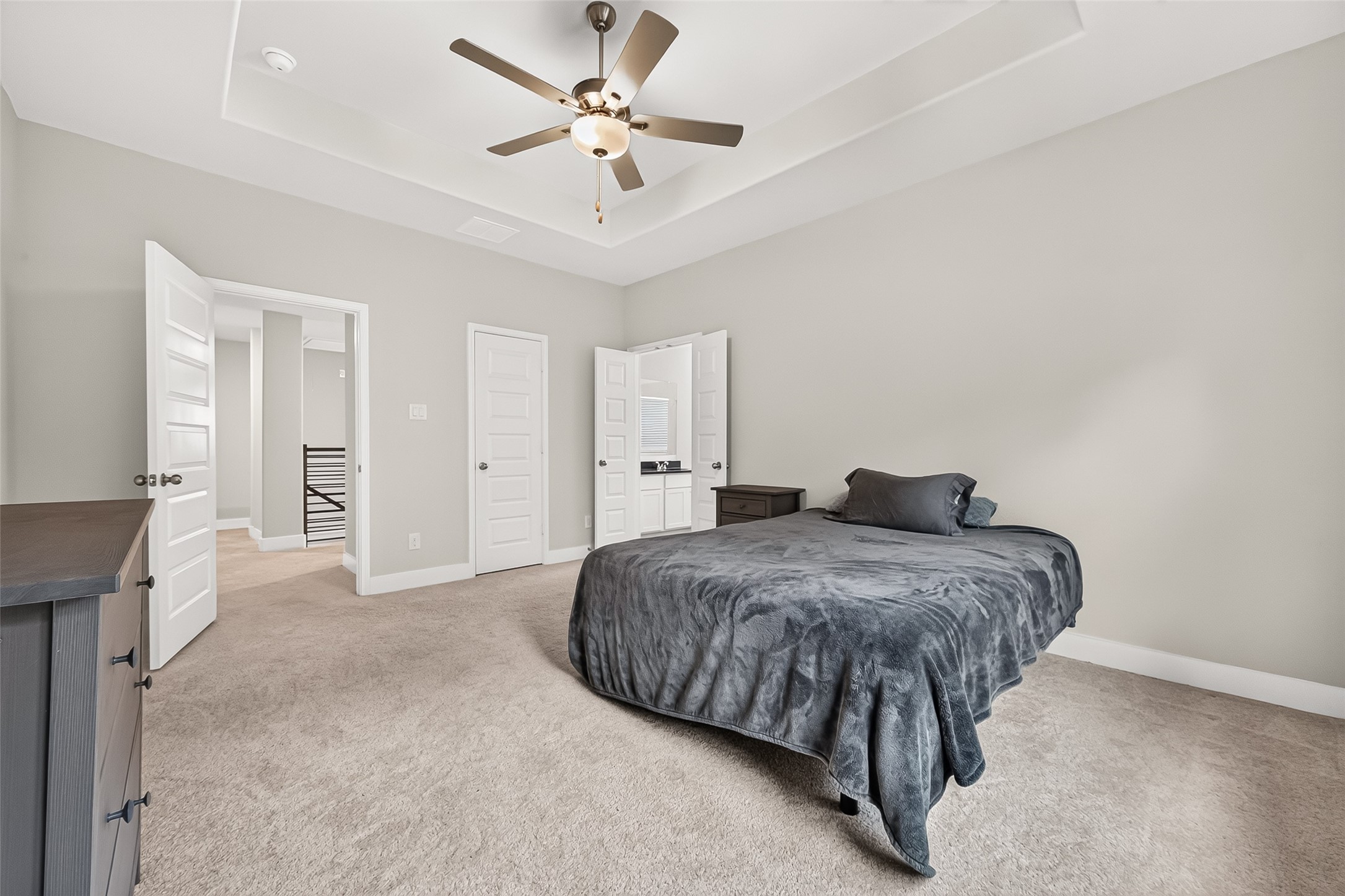 4004 Baja Lane Houston, TX 77045 - Photo 18 of 34 Your daily escape from the everyday hustle. Exceptional dimensions and a crisp, clean aesthetic define this impressive primary retreat. Strategically designed to capture soft, natural light from every angle, this comfortable and versatile space serves as a beautifully peaceful sanctuary.