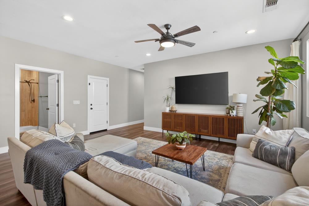 867 J Street Lincoln, CA 95648 - Photo 11 of 53 a living room with furniture and a flat screen tv