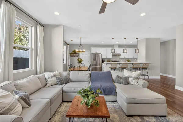 a bathroom with a toilet sink and shower