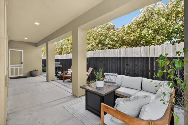 a outdoor living space with furniture and a couch