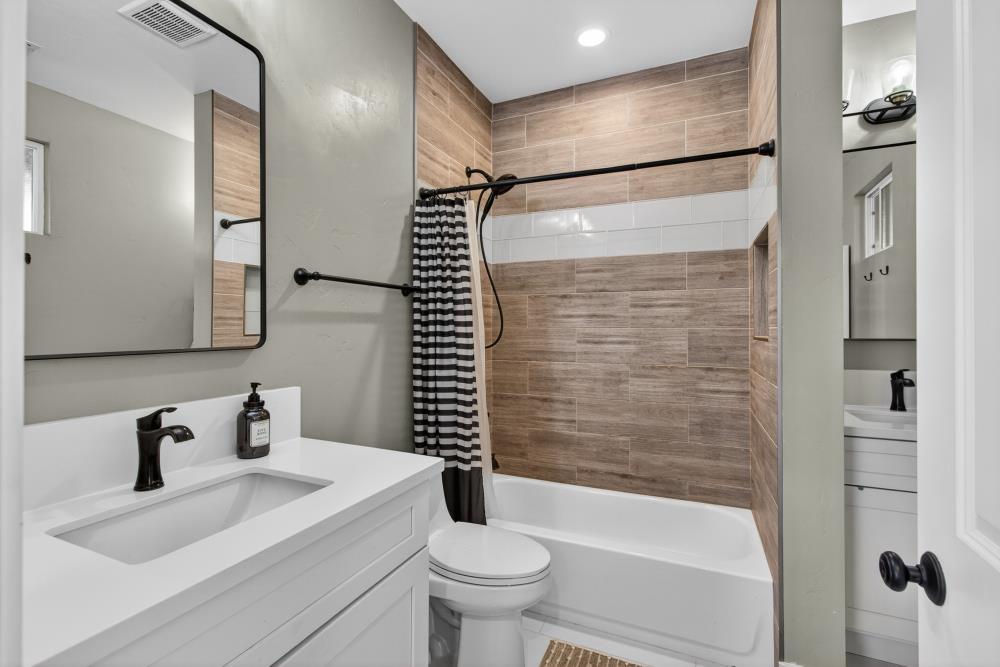 867 J Street Lincoln, CA 95648 - Photo 36 of 53 a bathroom with a sink toilet and shower