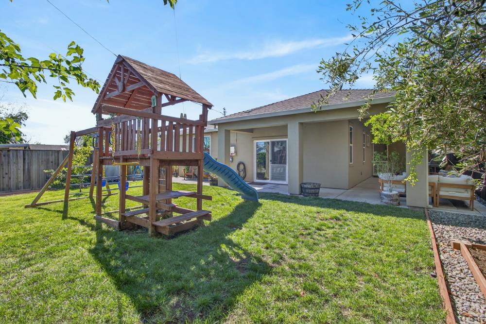 867 J Street Lincoln, CA 95648 - Photo 46 of 53 a view of a house with backyard and sitting area