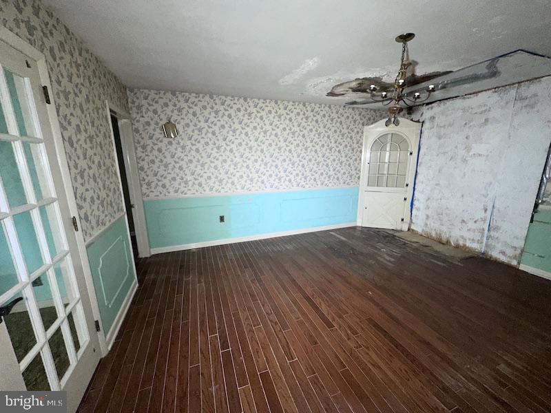 245 Gibbsboro Road Clementon, NJ 08021 - Photo 11 of 29 a view of a room with wooden floor and white walls