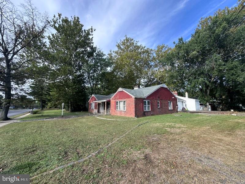 245 Gibbsboro Road Clementon, NJ 08021 - Photo 2 of 29 a view of a big yard with large trees