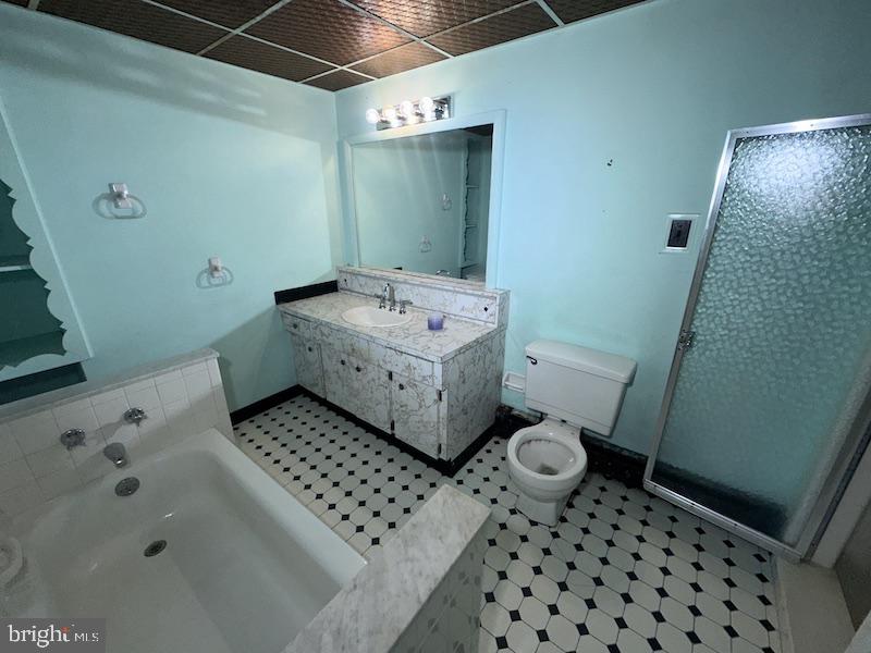 245 Gibbsboro Road Clementon, NJ 08021 - Photo 24 of 29 a bathroom with a sink a toilet and shower