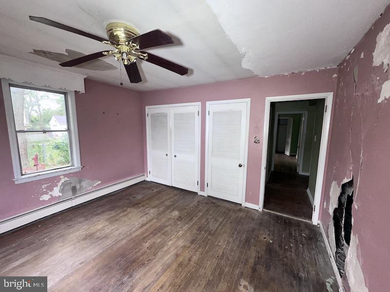245 Gibbsboro Road Clementon, NJ 08021 - Photo 27 of 29 wooden floor in an empty room with a window