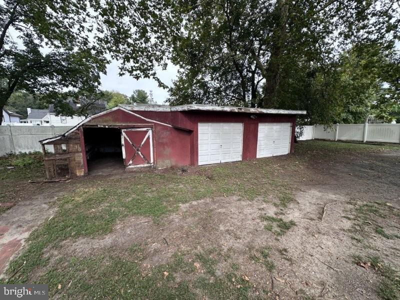 245 Gibbsboro Road Clementon, NJ 08021 - Photo 4 of 29 a front view of a house with a yard and garage