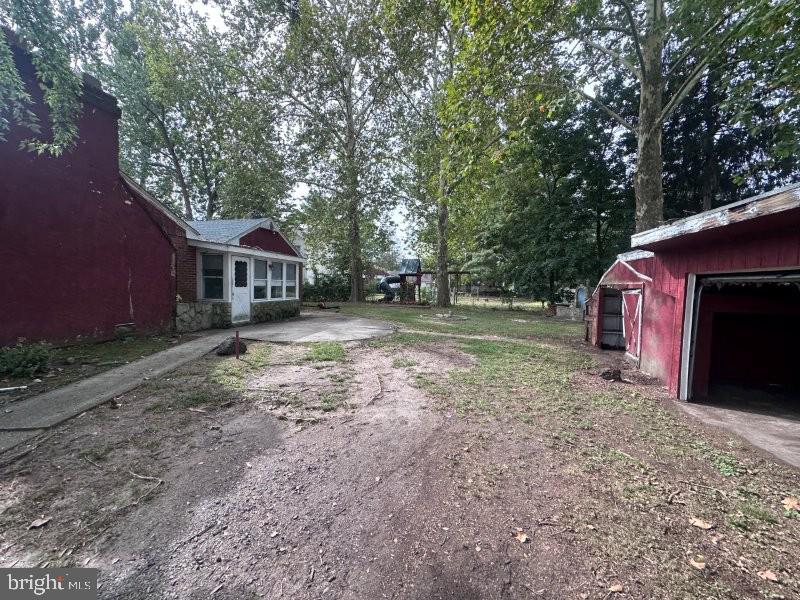 245 Gibbsboro Road Clementon, NJ 08021 - Photo 6 of 29 a view of a house with a yard and large tree