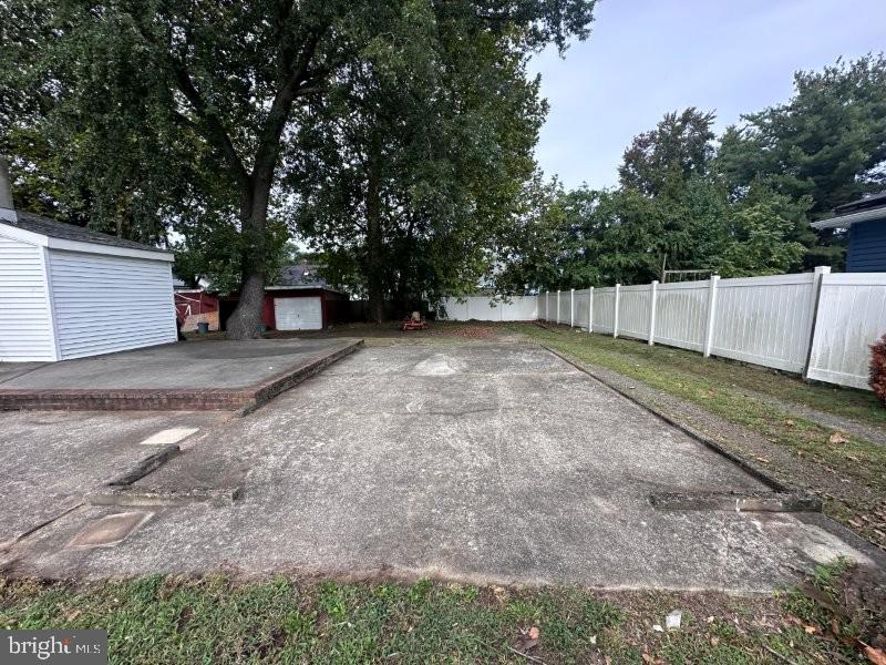 245 Gibbsboro Road Clementon, NJ 08021 - Photo 7 of 29 a view of a yard with wooden fence