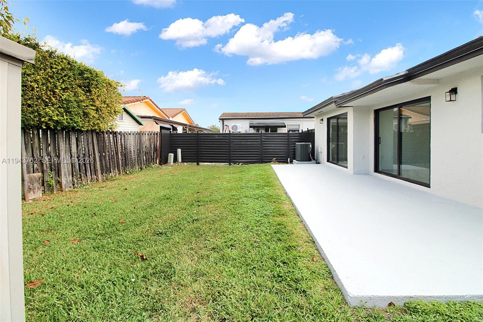 13379 Northwest 3rd Terrace Miami, FL 33182 - Photo 19 of 23 a view of a backyard with pathway