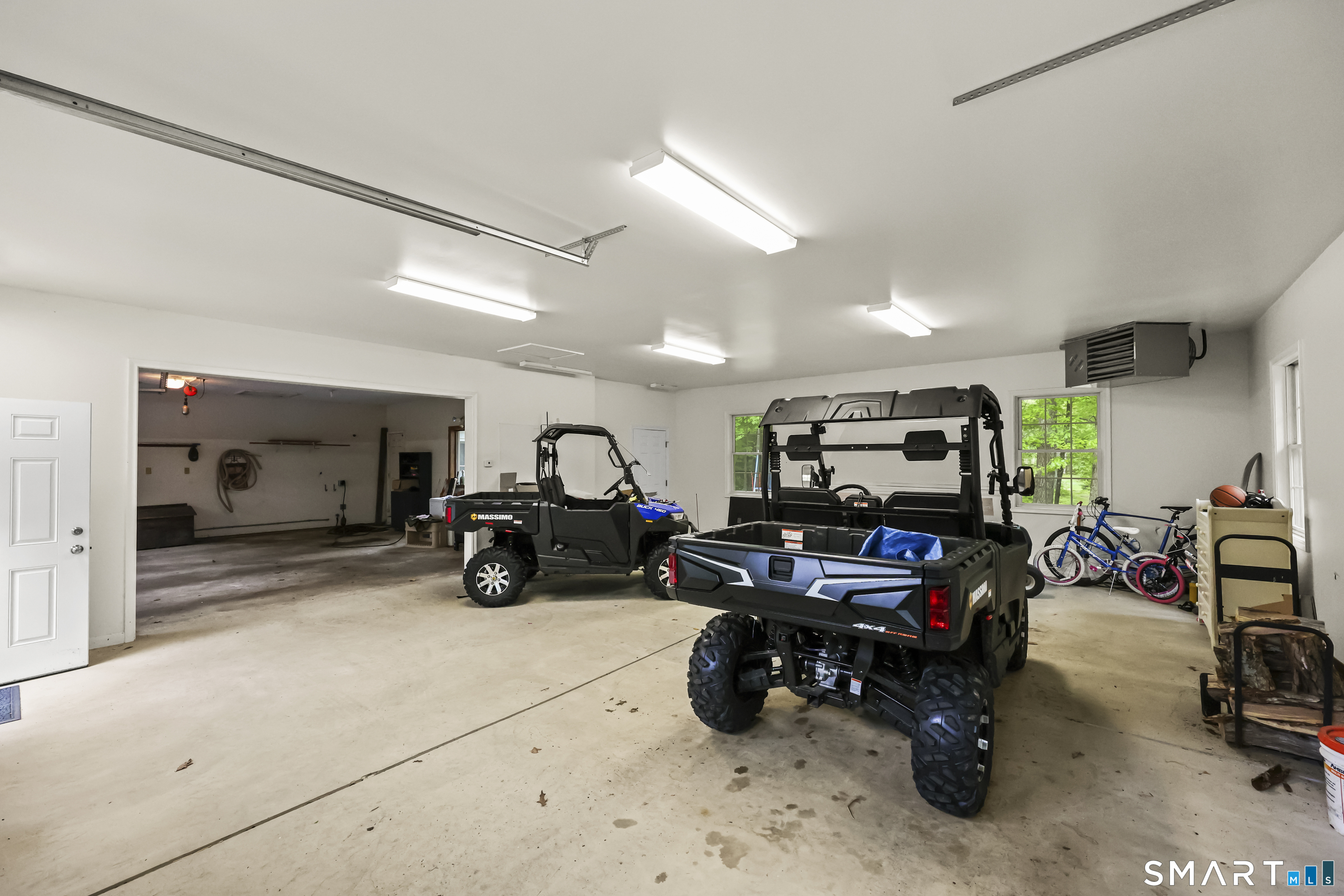 96 Spak Road Willington, CT 06279 - Photo 29 of 40 Attached 3/4 car heated garage offers comfort & convenience throughout the seasons.