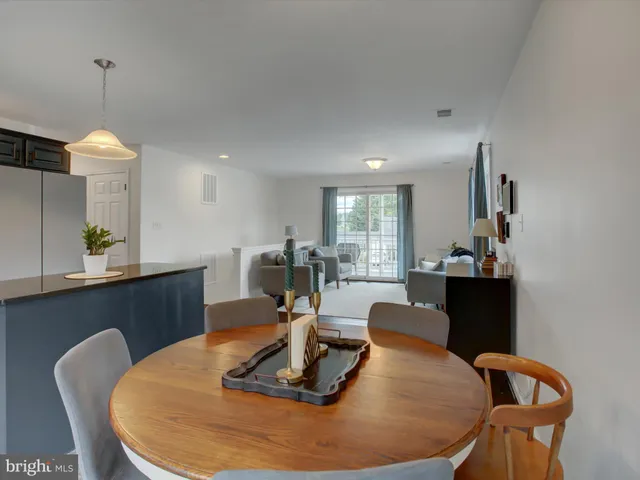 a dining room with a table or chairs and a wooden floor