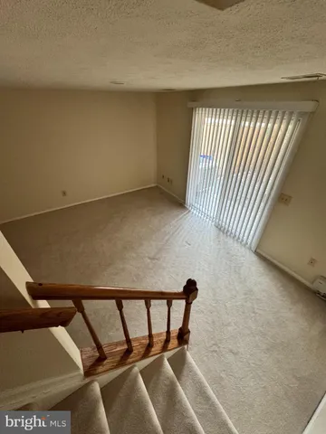 a view of a room with staircase