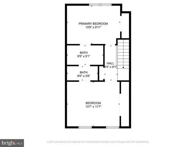 a picture of a bench in front of a wall