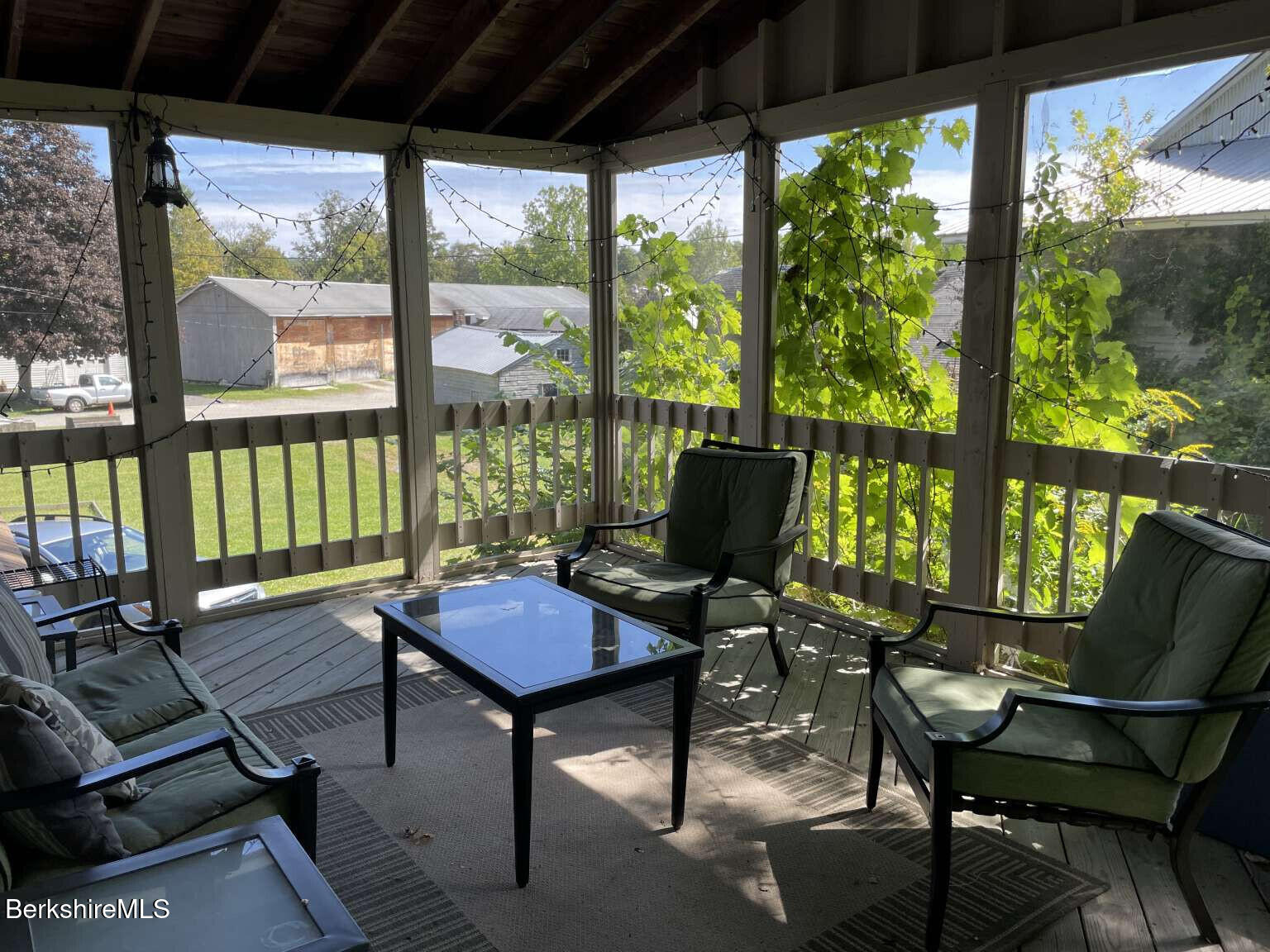 5 Seekonk Road Great Barrington, MA 01230 - Photo 3 of 19 a living room with furniture and a floor to ceiling window
