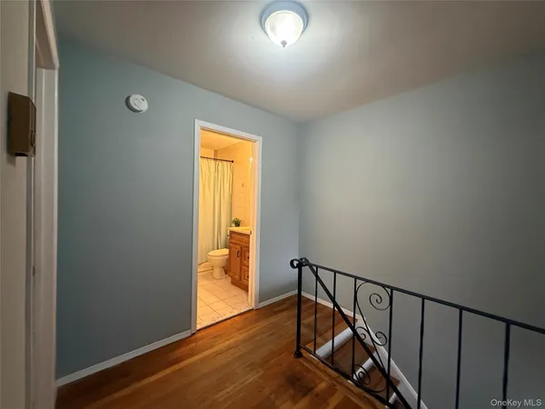 a view of entryway with wooden floor