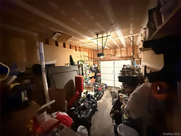 a view of entryway and kitchen