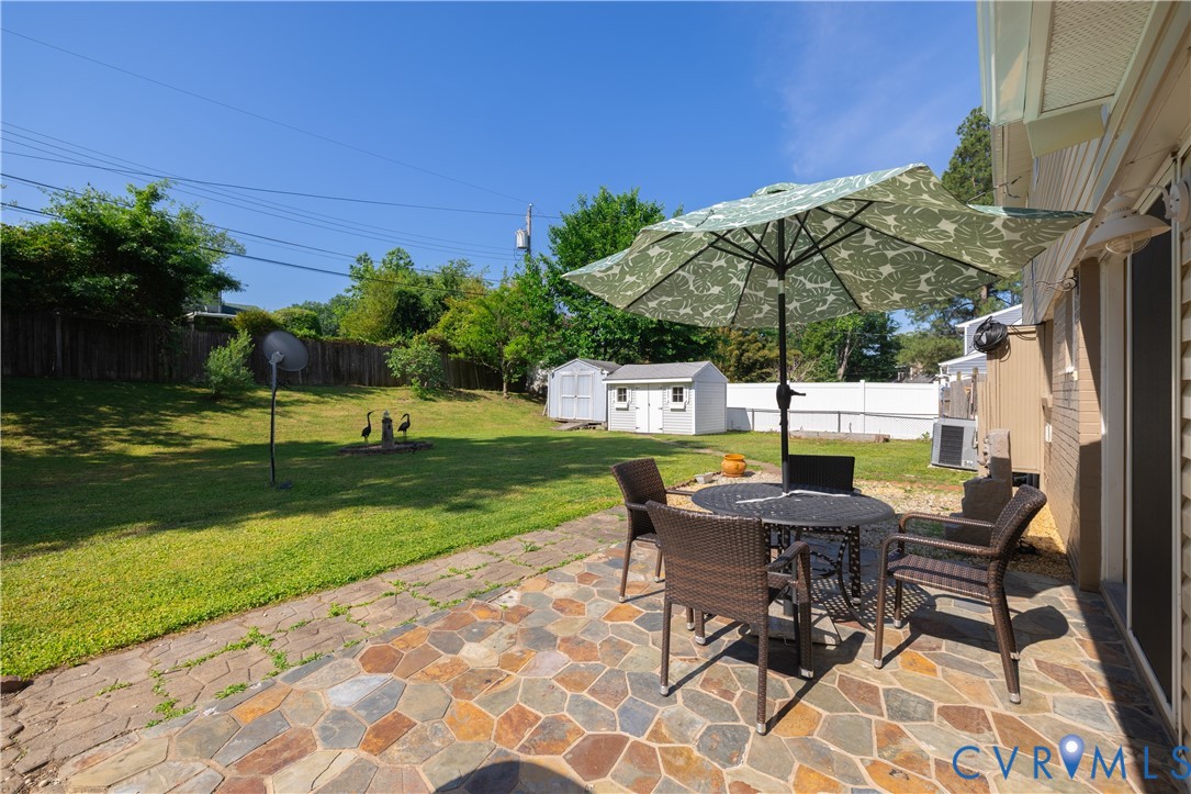 9217 Fisk Road Richmond, VA 23229 - Photo 28 of 39 a view of a backyard with sitting area