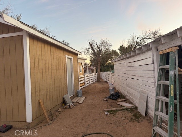 16100 Navajo Road Apple Valley, CA 92307 - Photo 12 of 55 a view of backyard with cabin