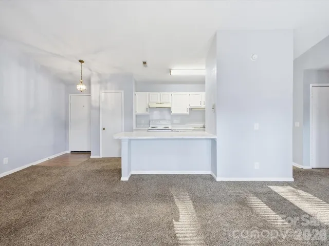 a view of a kitchen with a sink