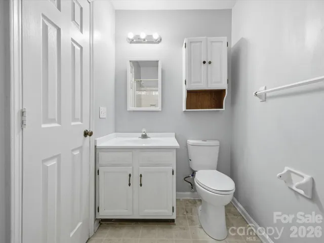 a view of a balcony with wooden floor and stairs