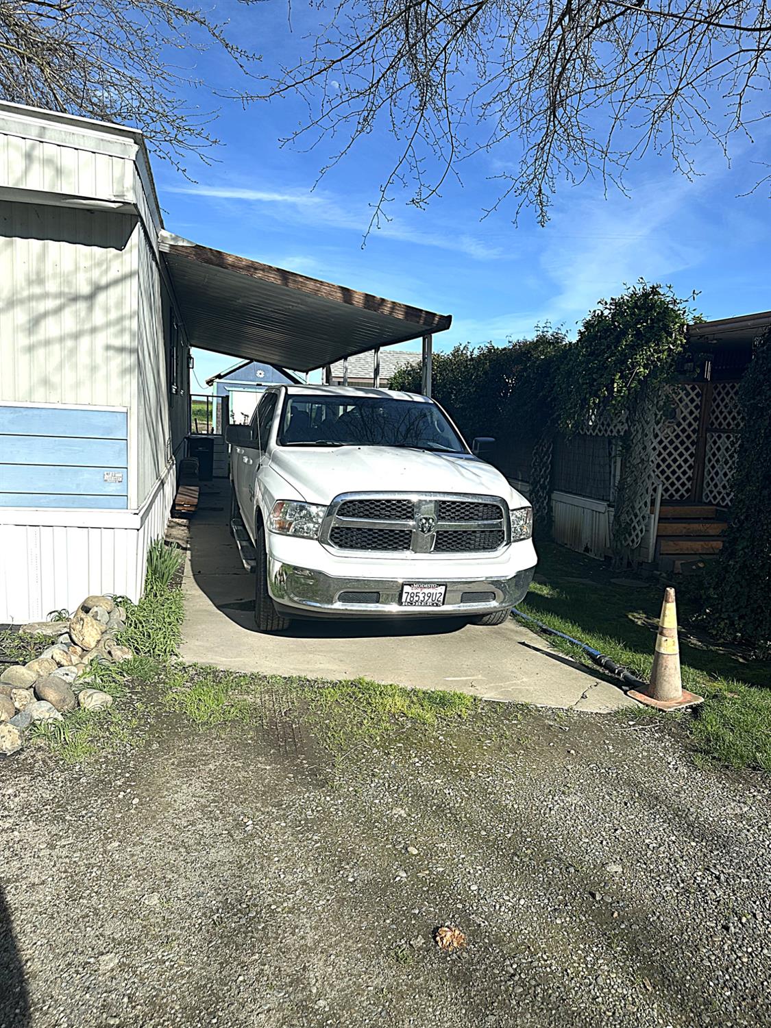 13955 West Walnut Grove Road, Unit 16 Walnut Grove, CA 95690 - Photo 16 of 18 a car parked in garage