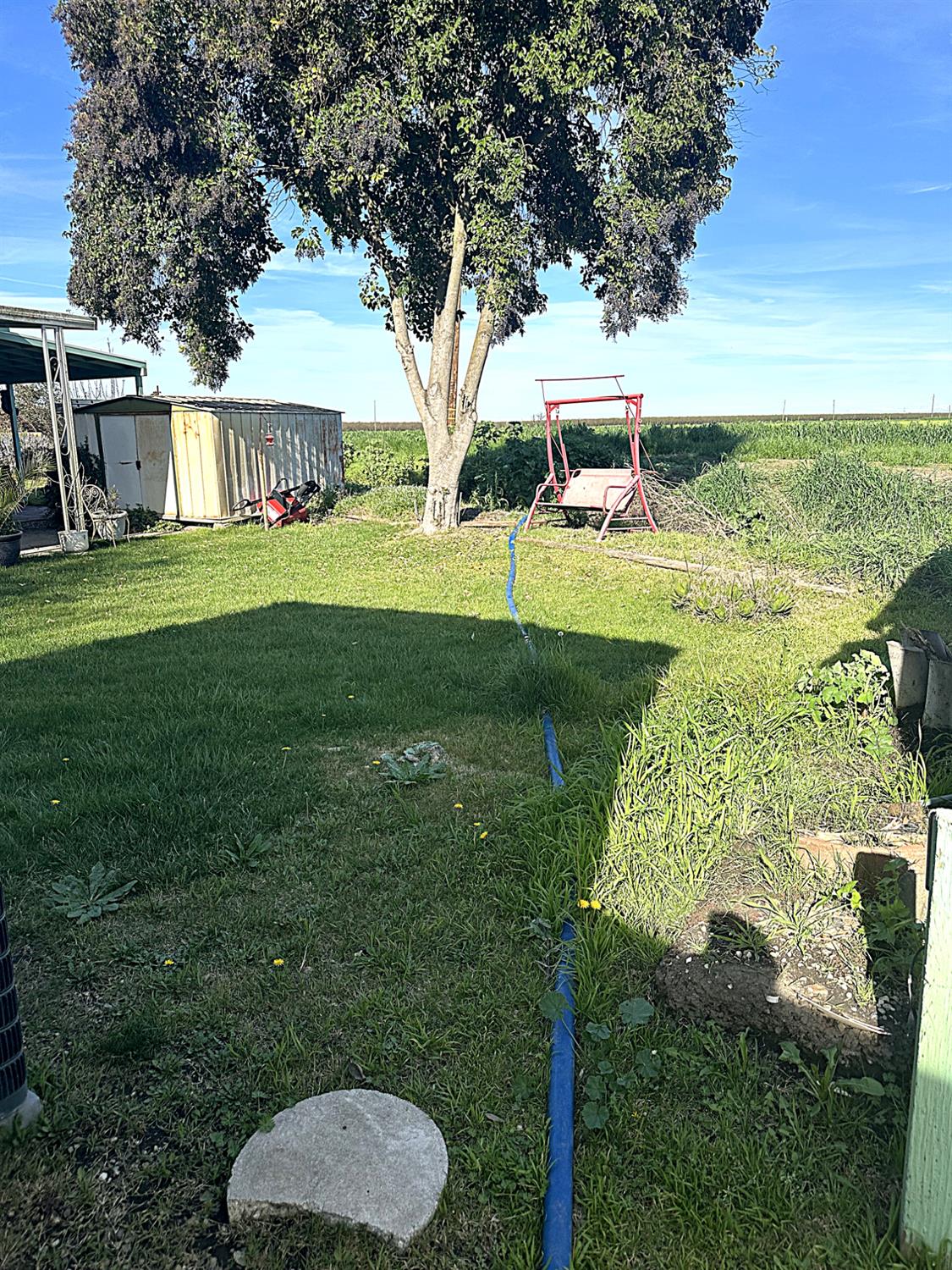 13955 West Walnut Grove Road, Unit 16 Walnut Grove, CA 95690 - Photo 2 of 18 a view of a house with a yard