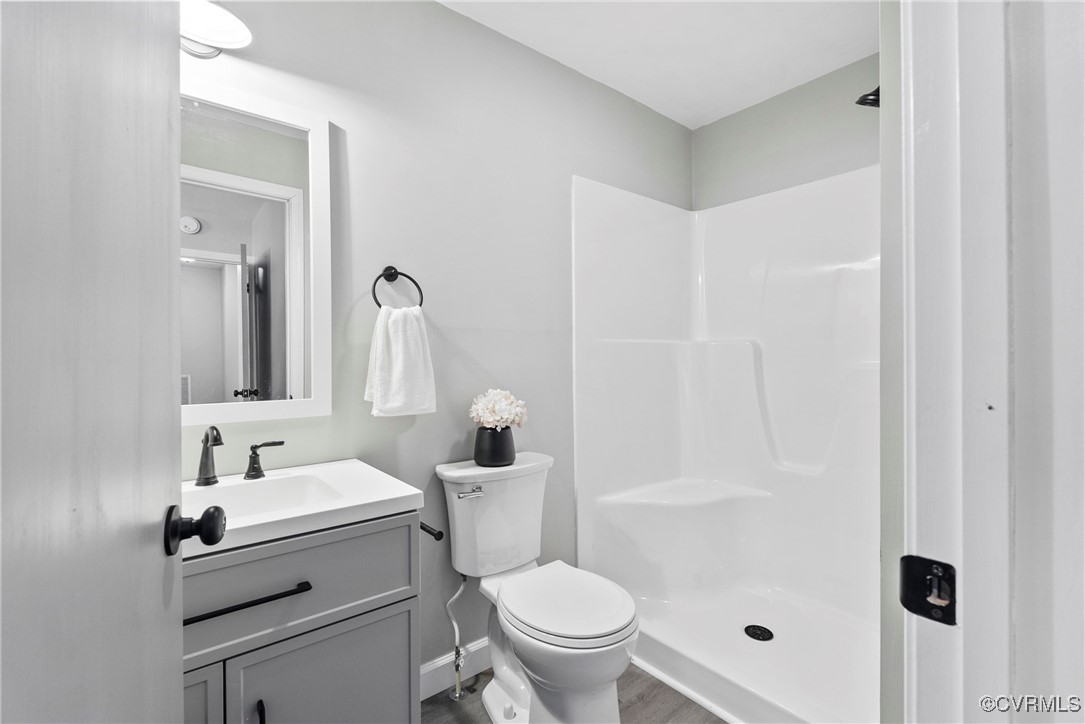 1611 Cumberland Road Farmville, VA 23901 - Photo 26 of 47 Bathroom featuring vanity, hardwood / wood-style f