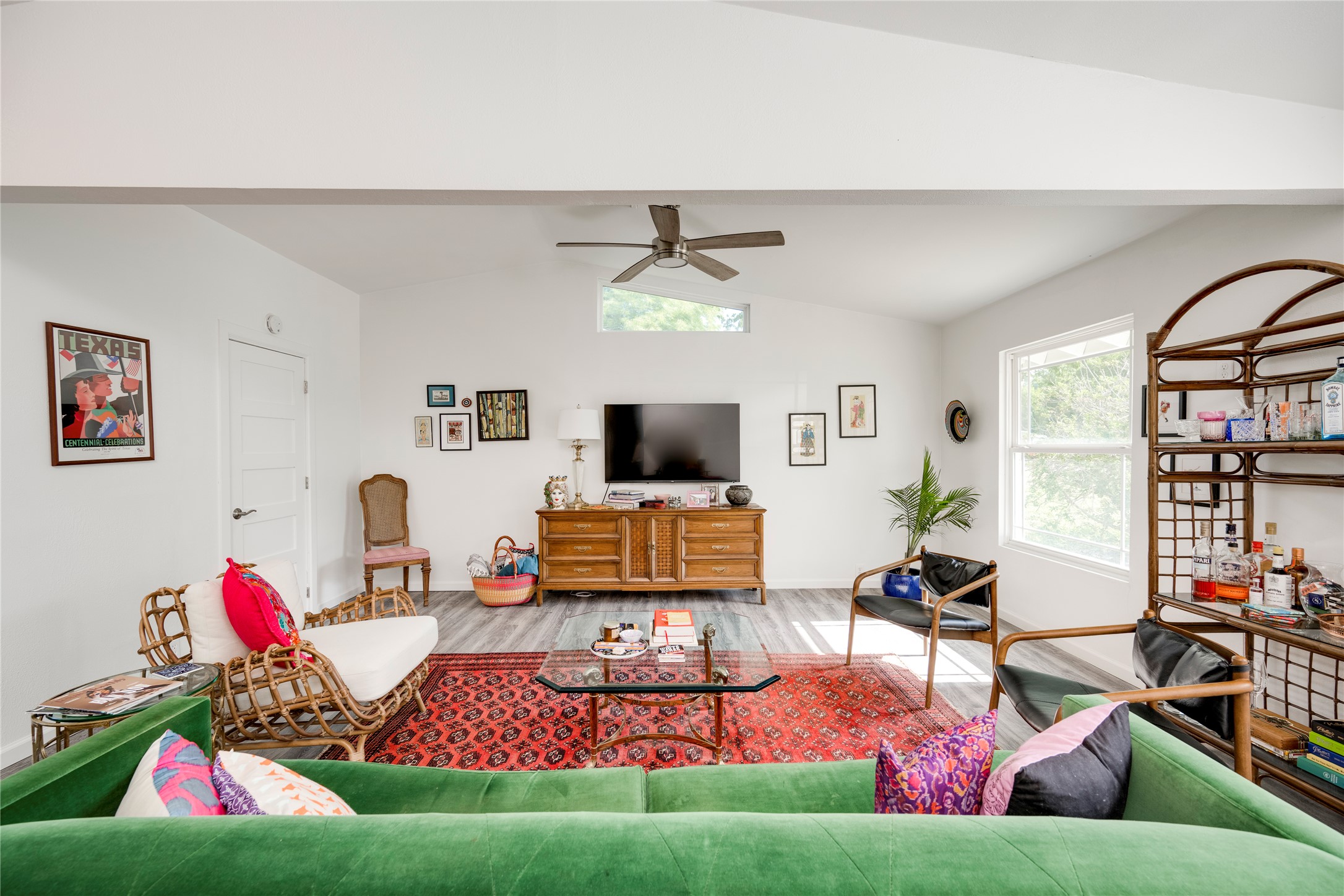 5300 Halmark Drive Austin, TX 78723 - Photo 6 of 40 Relax in this comfortable living room featuring vaulted ceilings and abundant natural illumination.