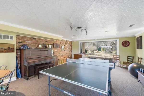 a kitchen with stainless steel appliances granite countertop a stove and a refrigerator