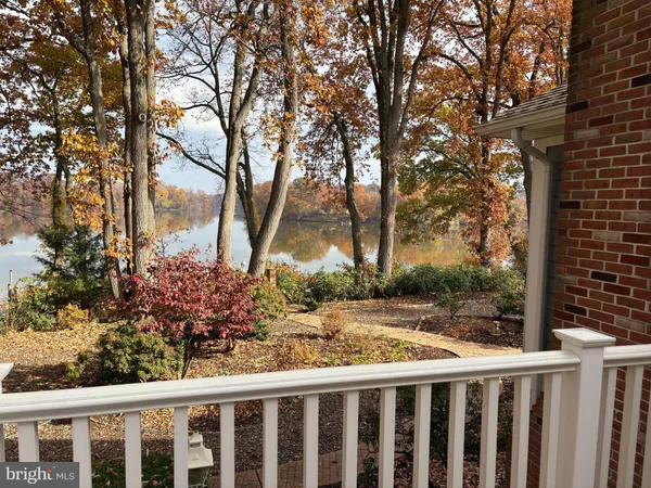 a view of a bench in patio of a house
