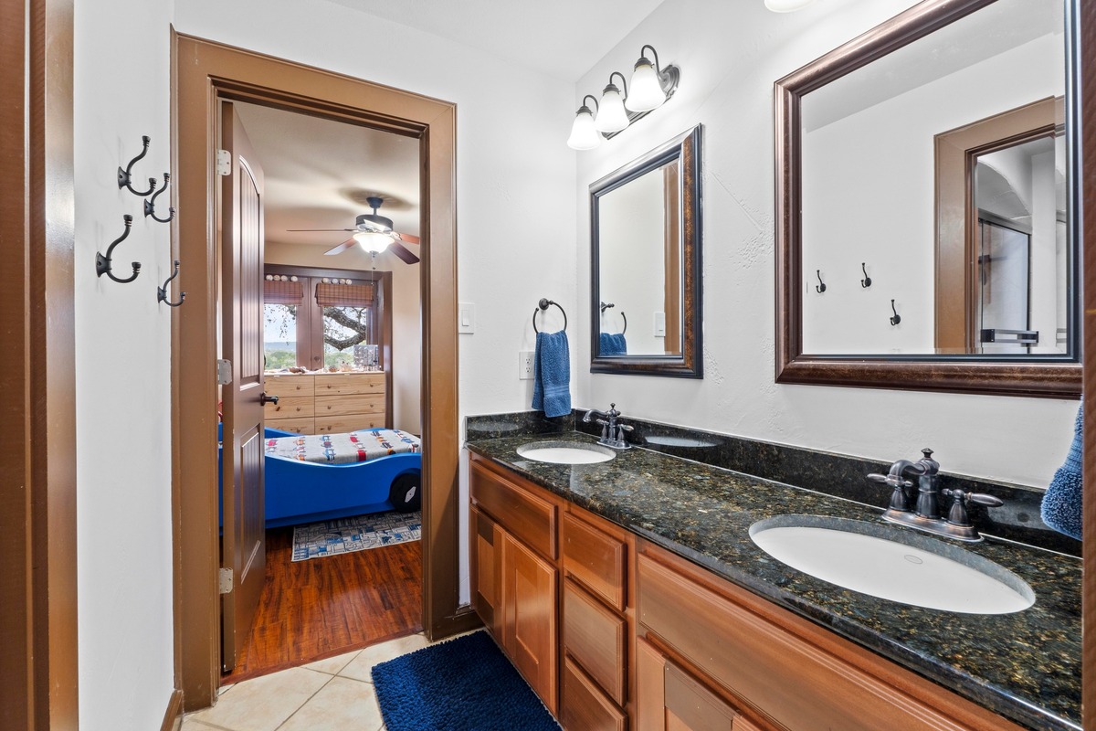 8211 Moon Rise Trail Jonestown, TX 78645 - Photo 31 of 34 Spacious Jack and Jill bath at secondary upstairs bedrooms.