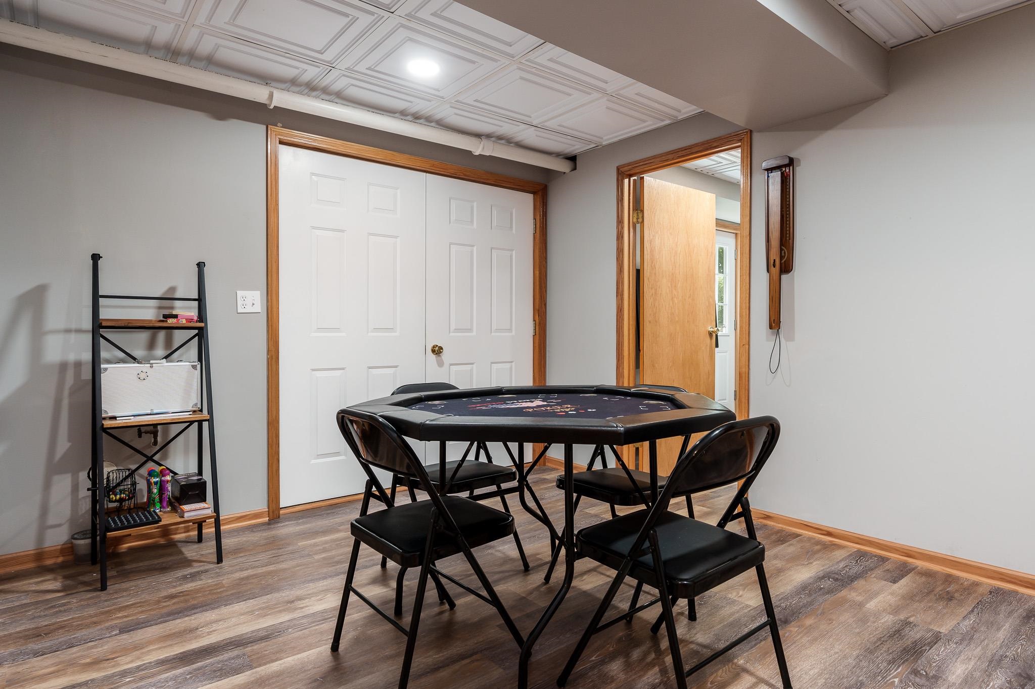 10249 Atwood Road Roscoe, IL 61073 - Photo 35 of 58 a view of a dining room with furniture and wooden floor