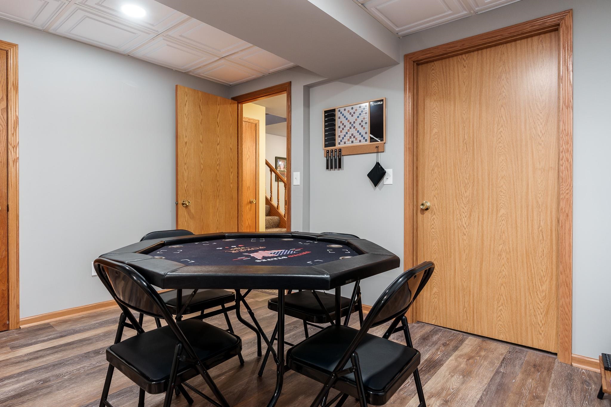 10249 Atwood Road Roscoe, IL 61073 - Photo 36 of 58 a view of a dining room with furniture and wooden floor