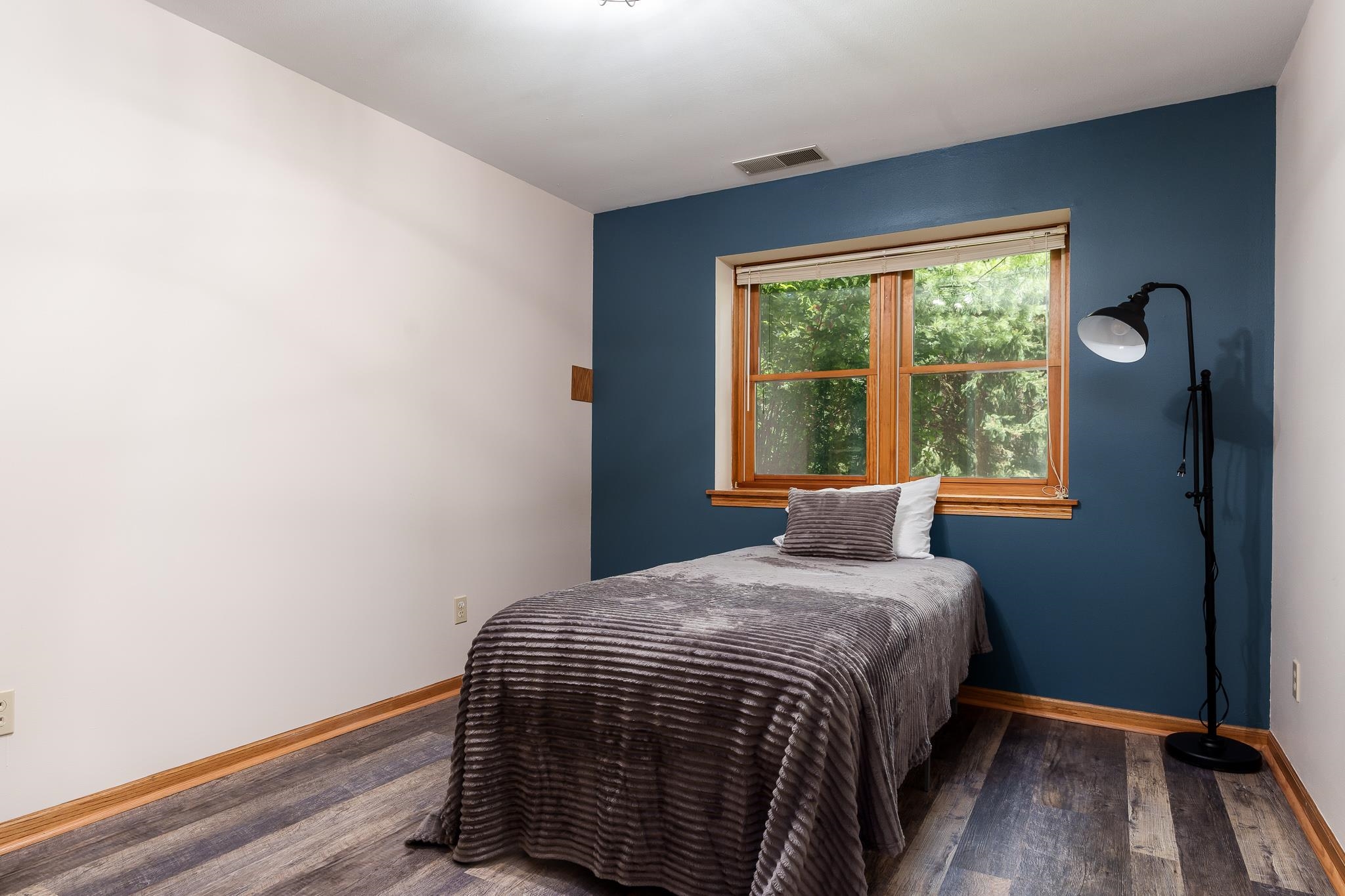 10249 Atwood Road Roscoe, IL 61073 - Photo 39 of 58 a bedroom with a bed and a window