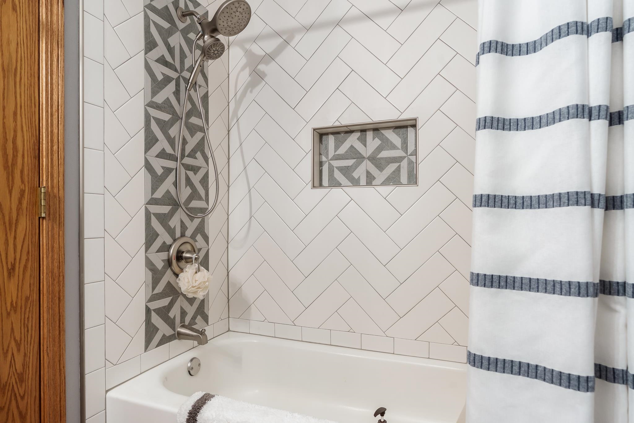 10249 Atwood Road Roscoe, IL 61073 - Photo 42 of 58 a bathroom with a bathtub and shower