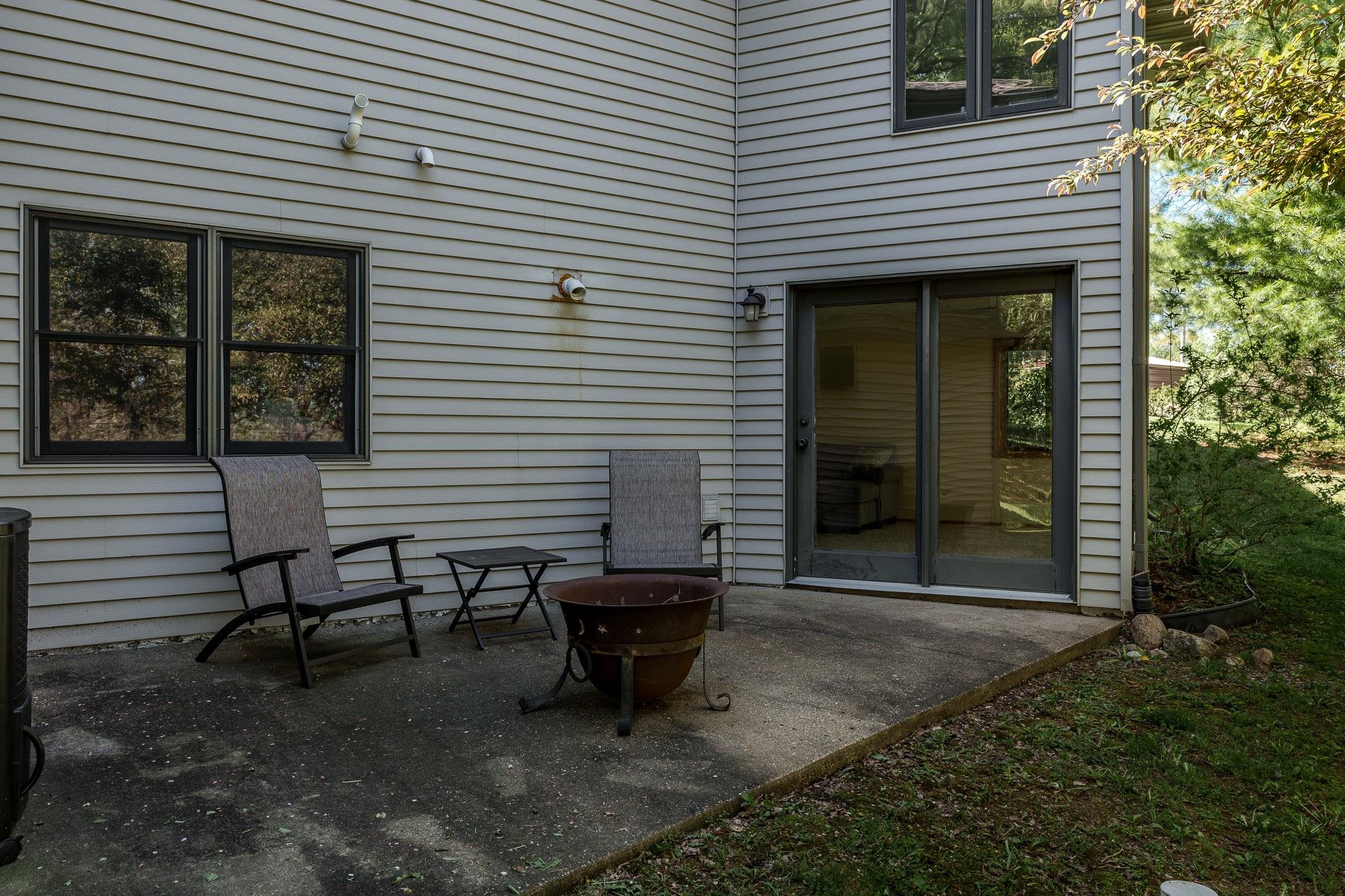 10249 Atwood Road Roscoe, IL 61073 - Photo 48 of 58 a view of a two chair in the backyard