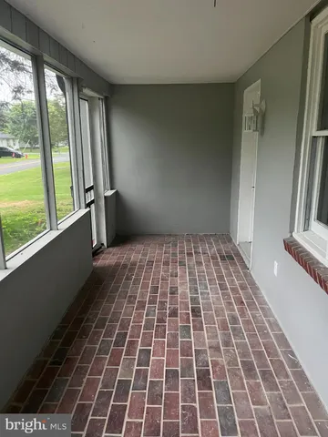 a view of a house with a yard from a window