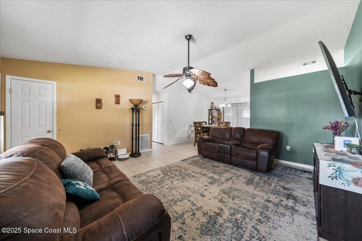 5575 Curtis Boulevard Cocoa, FL 32927 - Photo 5 of 25 a living room with furniture