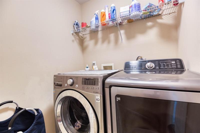 1008 Post Horn Run Lawrenceville, GA 30045 - Photo 28 of 64 a utility room with dryer and washer