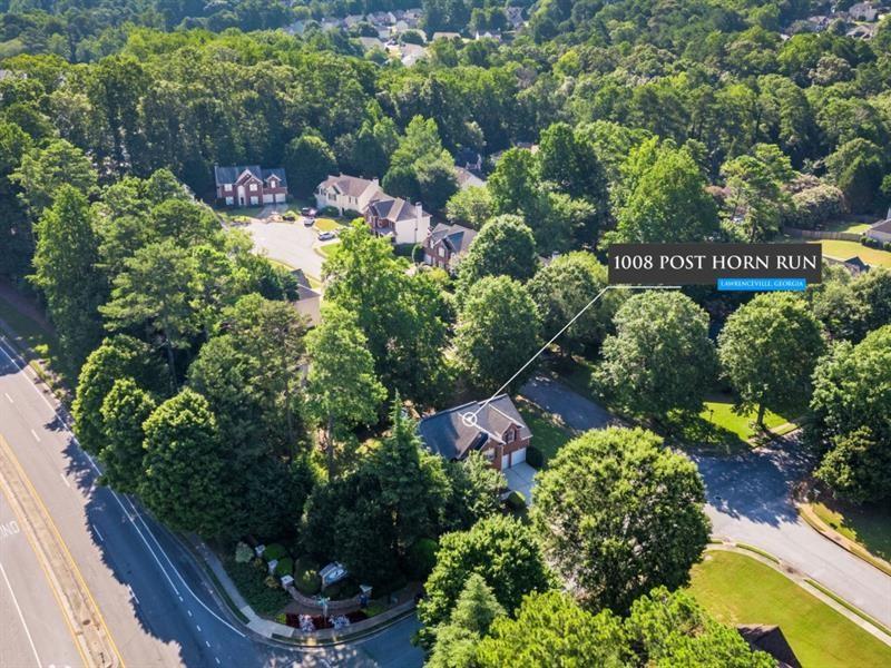 1008 Post Horn Run Lawrenceville, GA 30045 - Photo 62 of 64 a view of a garden with a lot of flowers