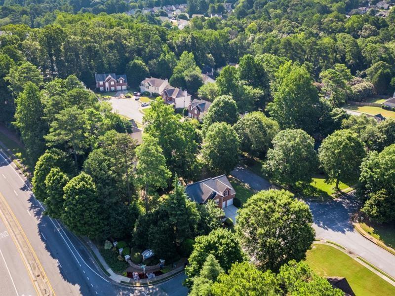 1008 Post Horn Run Lawrenceville, GA 30045 - Photo 64 of 64 a bunch of flowers are in a garden