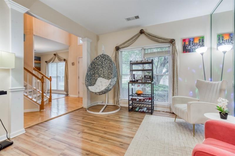 1008 Post Horn Run Lawrenceville, GA 30045 - Photo 7 of 64 a living room with furniture and wooden floor