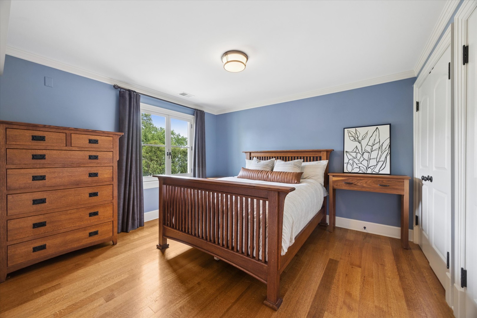 325 Princeton Road Hinsdale, IL 60521 - Photo 32 of 55 a bedroom with a bed and a window