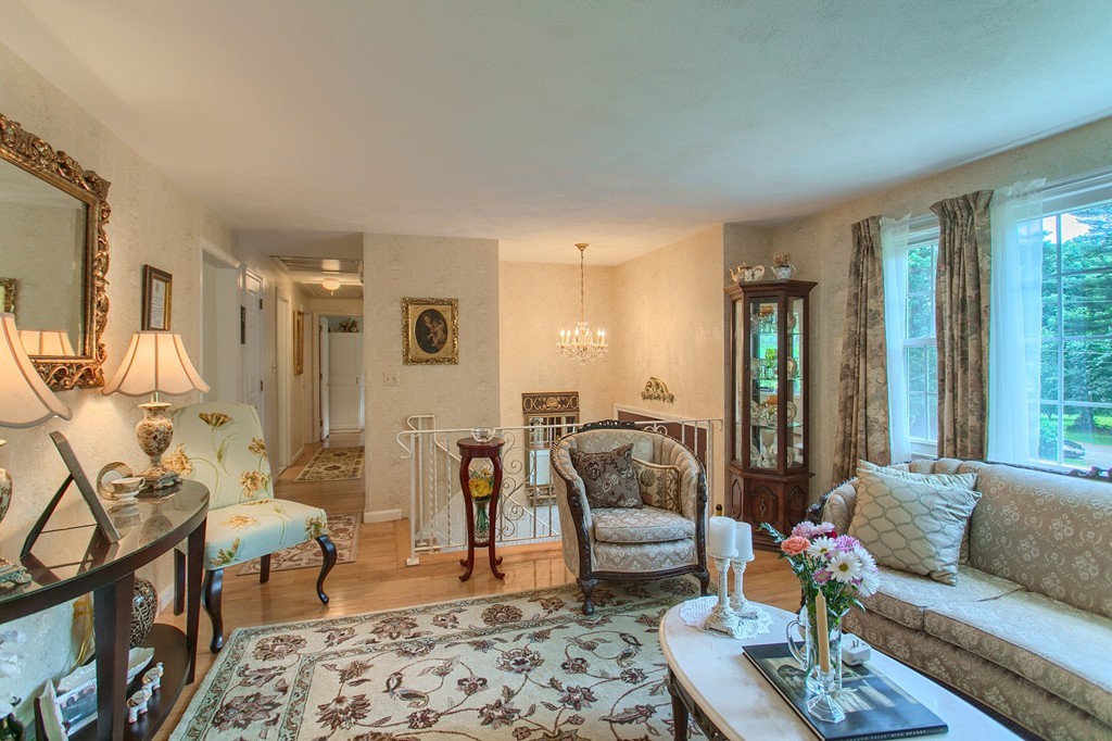 4 Dobson Road Chelmsford, MA 01824 - Photo 6 of 25 a living room with furniture and a couch