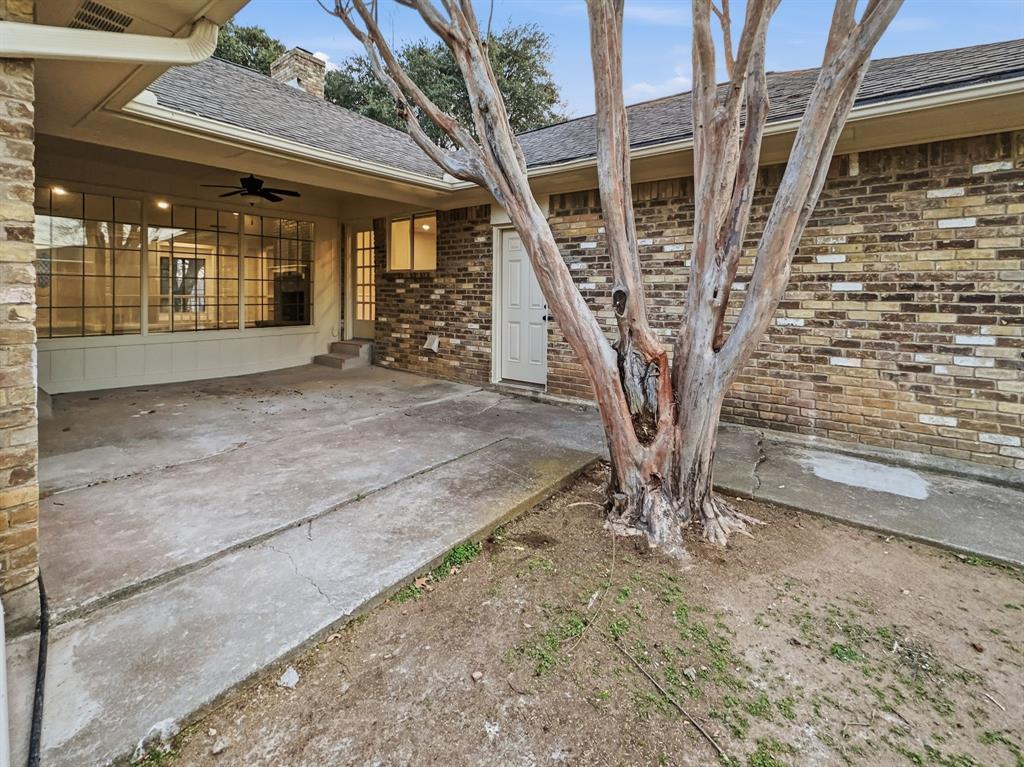 2409 Castle Street Irving, TX 75038 - Photo 30 of 32 a view of yard with seating space
