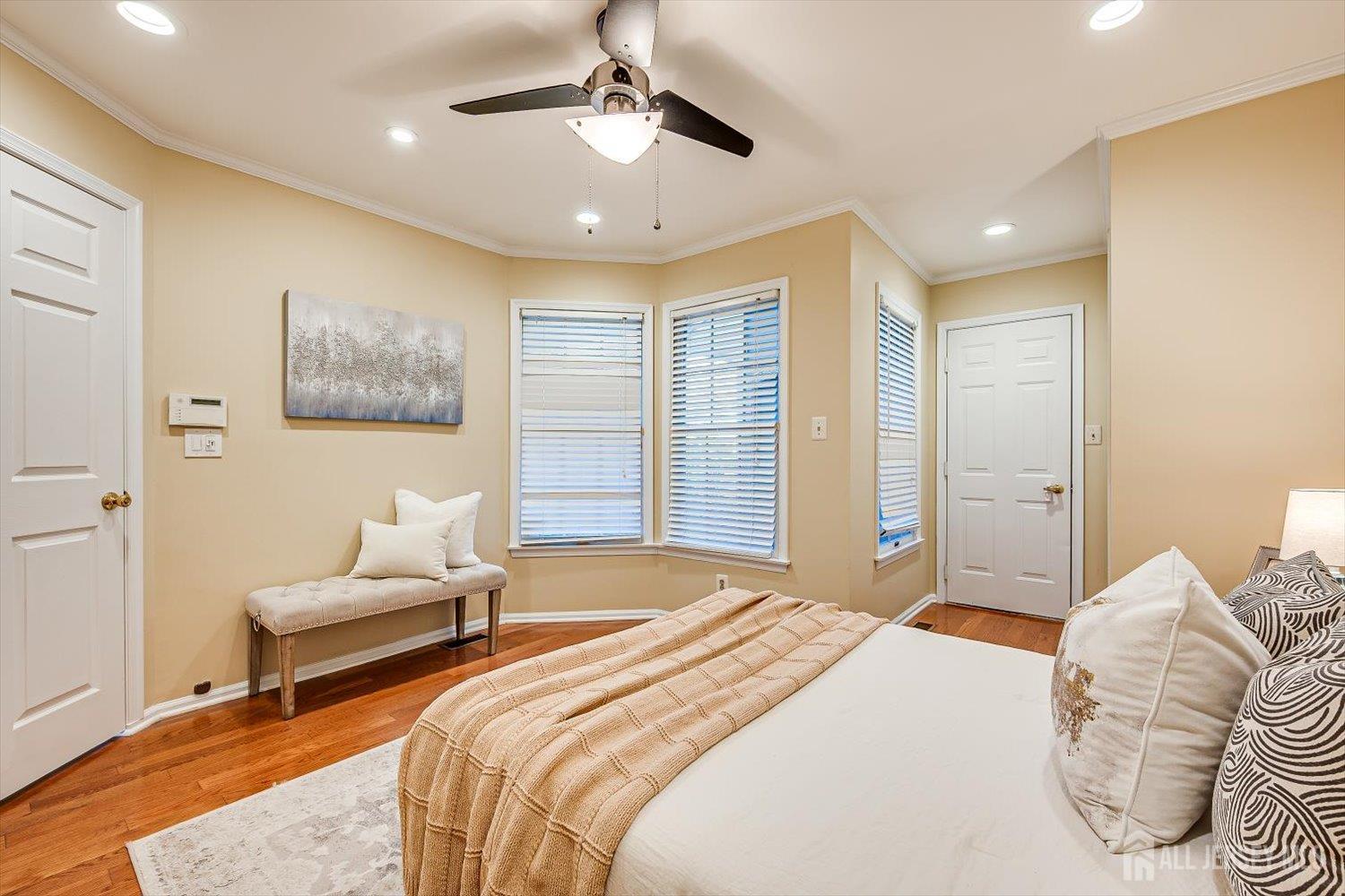 52 Springwood Court Princeton, NJ 08540 - Photo 16 of 34 a bedroom with a bed couches and ceiling fan